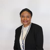 Grace-Toks Macaulay. Credit: Grace-Toks Macaulay. Headshot of Grace-Toks Macaulay. Grace-Toks is wearing a white top and black jacket.