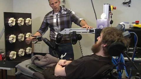 In a first, brain computer interface helps paralyzed man feel again