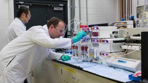 Adapting Continuous Flow Processing to Complex Nanomaterials to Reduce Manufacturing Costs