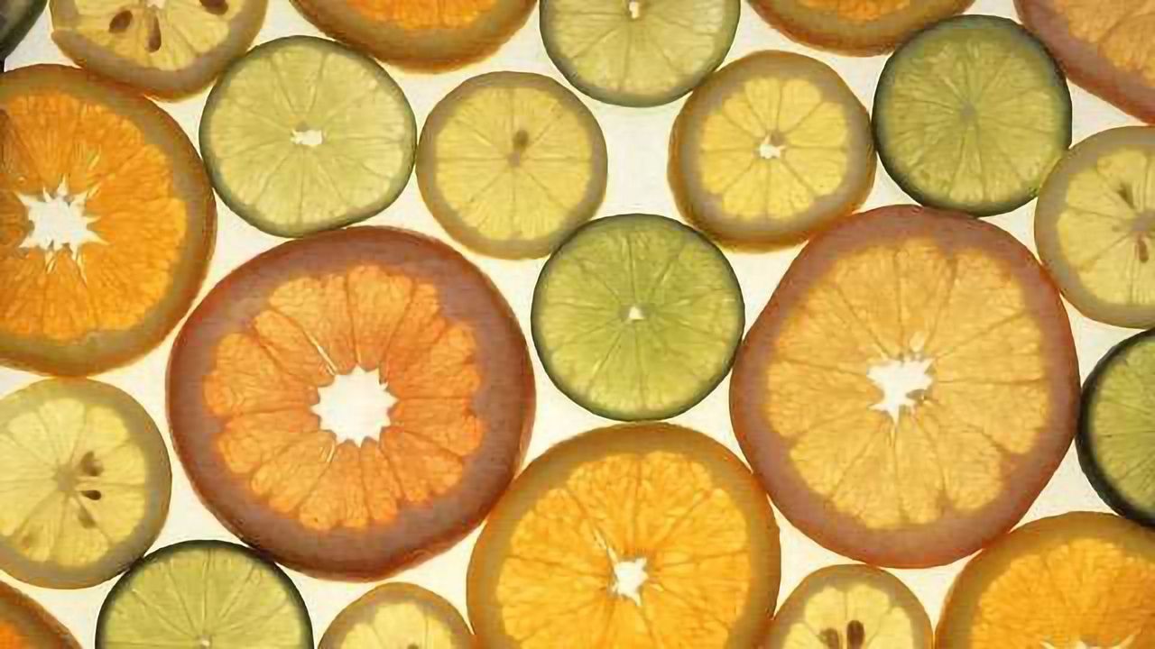 Citrus Fruit: The Ancient Acidless Mutation