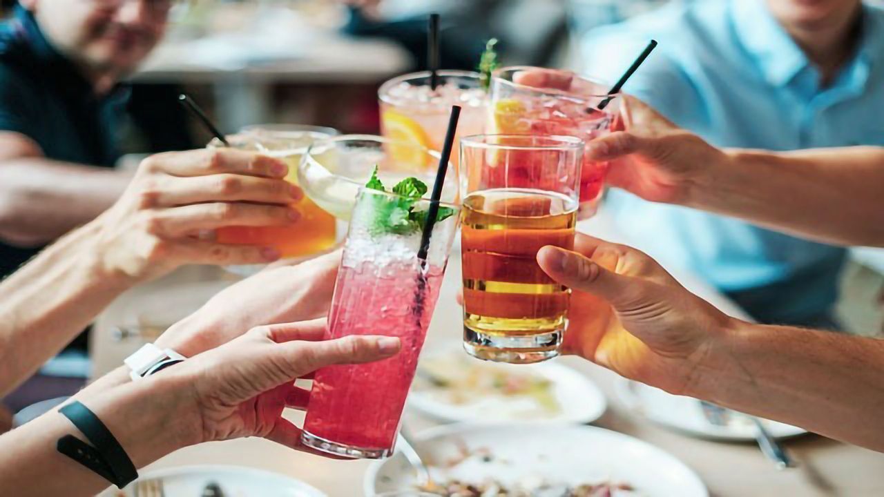 Genetic Drivers of Heavy Drinking and Alcoholism