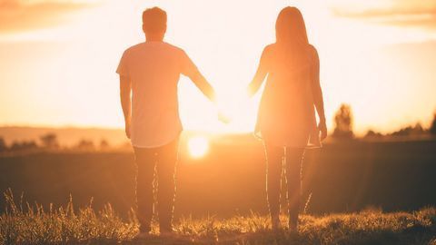 A Partner's Touch Eases Pain and Syncs Heart Rates