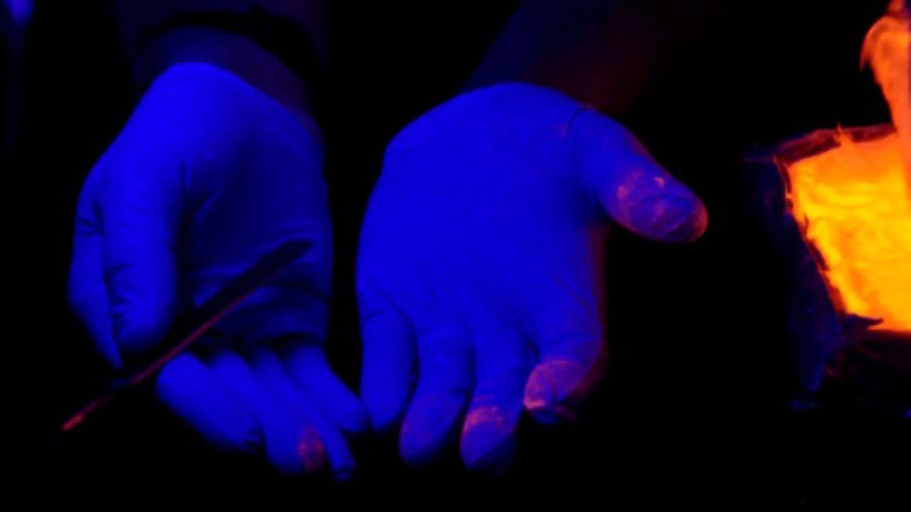Showing the Spread of Drug Particles Around a Forensic Lab