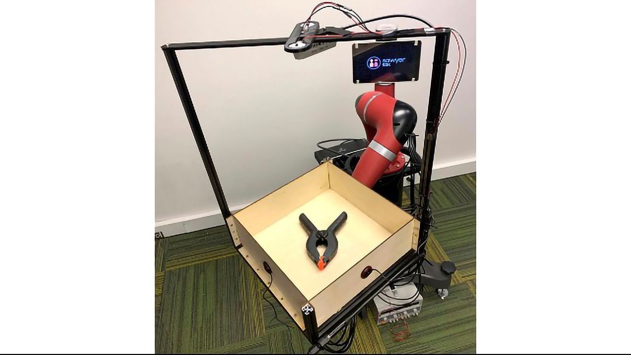 How Artificial Eyes and Ears Help "Tilt-Bot" Learn
