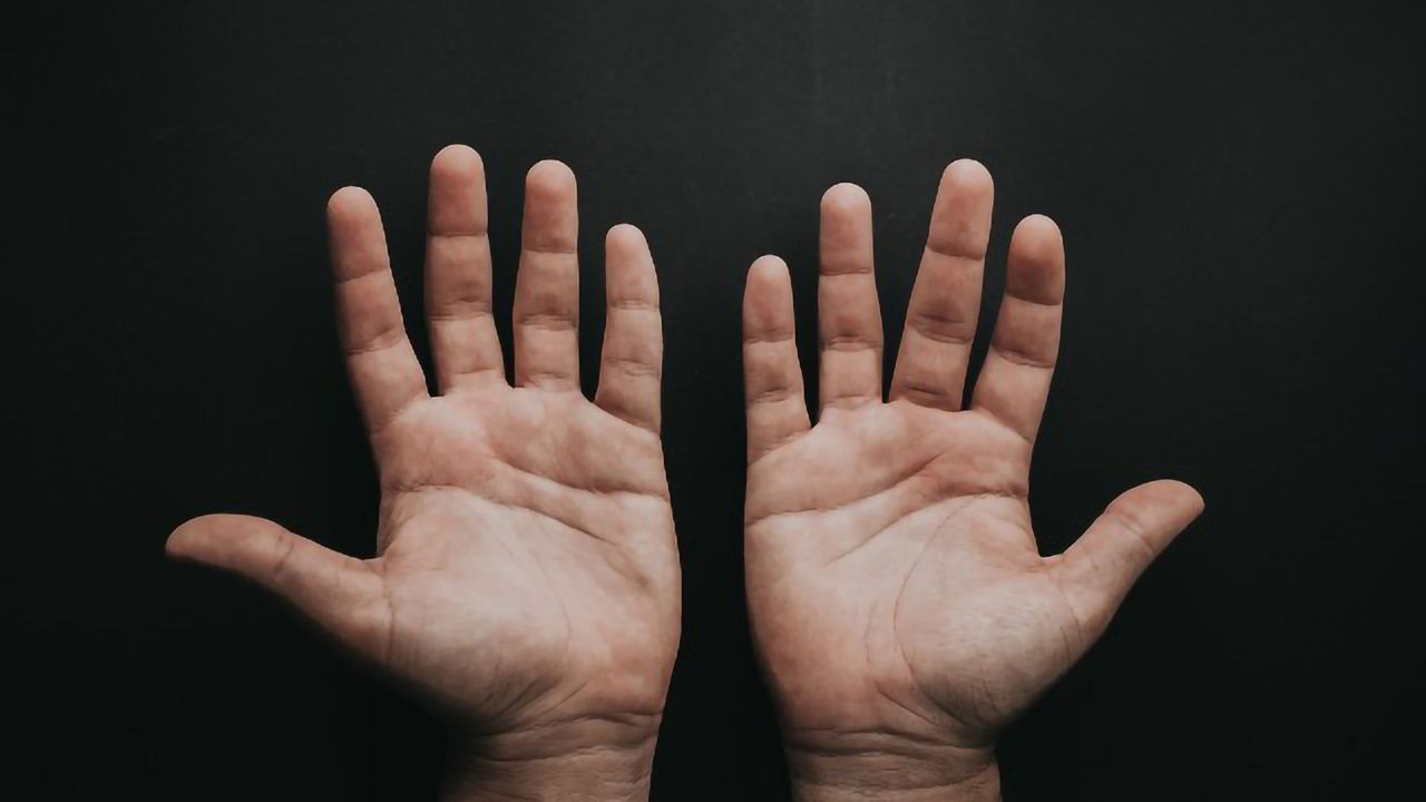 Brain Imaging During Tactile Stimulation Can Tell Left- and Right-Handers Apart