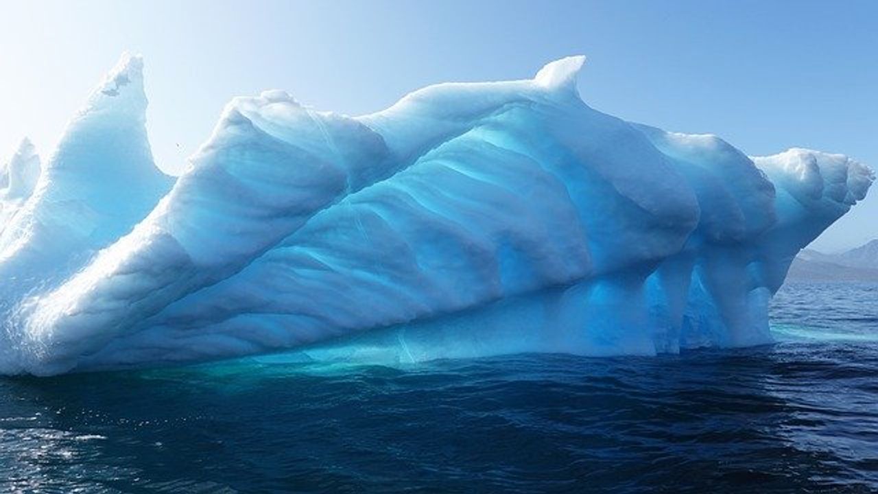 Global Flood Risk Highlighted by Satellite Monitoring of Greenland Ice Melt
