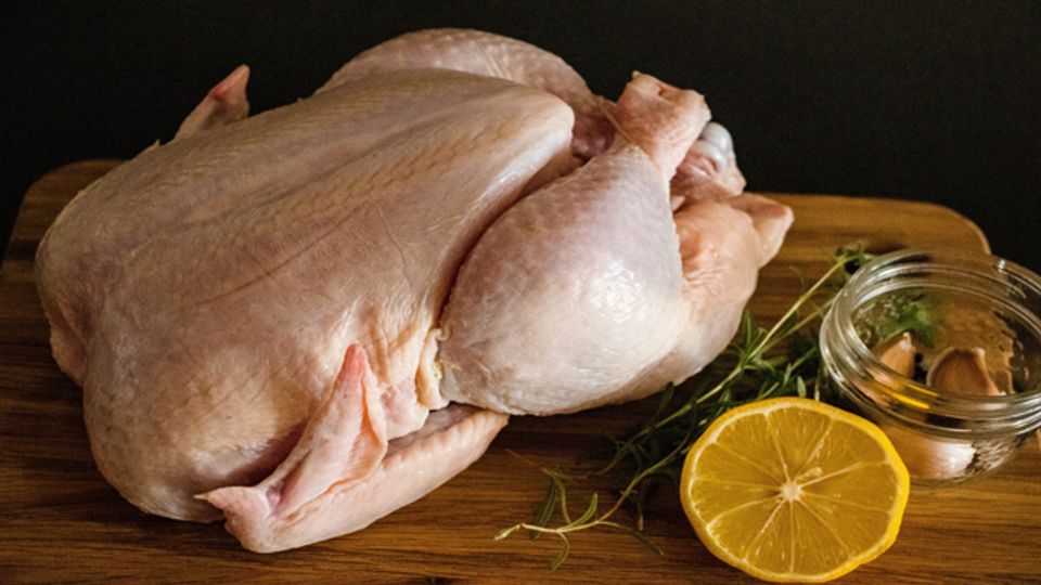 A picture of raw chicken.