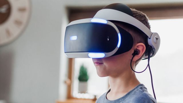 A child wearing a virtual reality headset. 