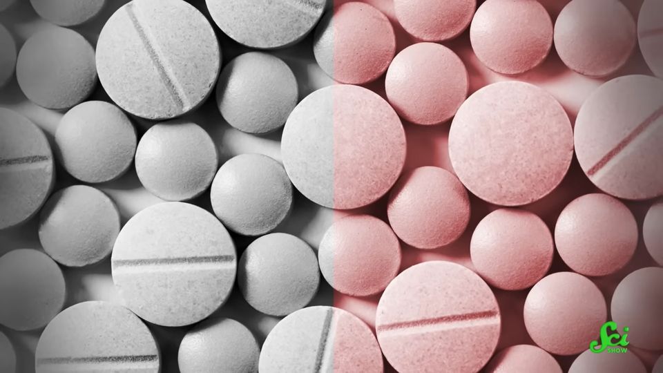 A half greyscale, half colour image of pills.