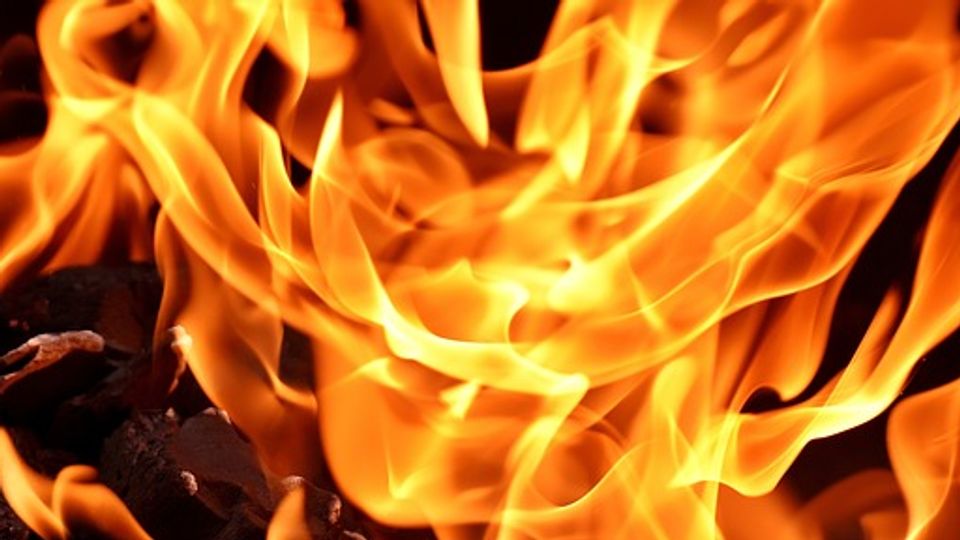 Close up of orange flames.