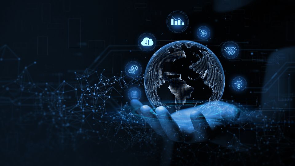 Human hand holding a digitized world.