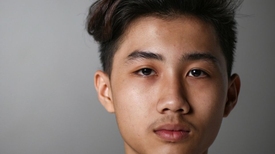 A young man's face.