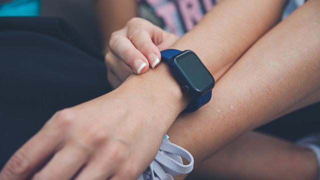 A smart watch worn on a person's left wrist. 