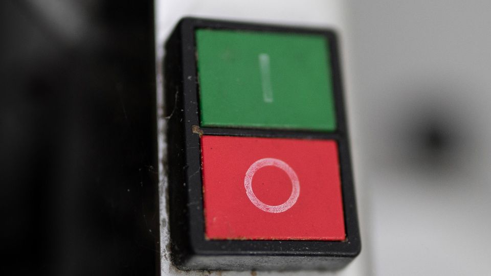 A green and red on/off switch.
