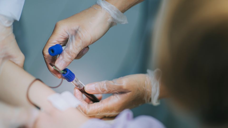 An individual having a blood test.