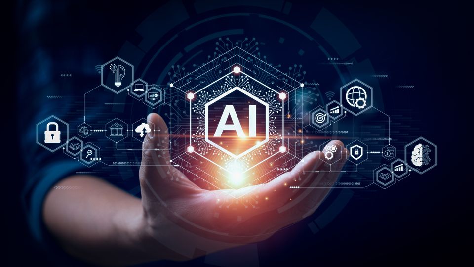 The letters AI in the palm of a hand.