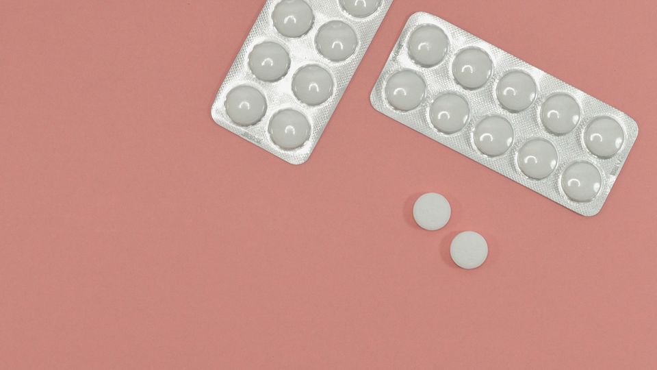 Two sleeves of oral medication.