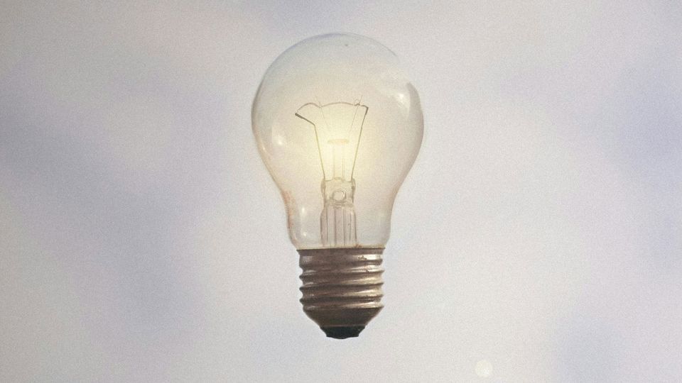 A lit light bulb.