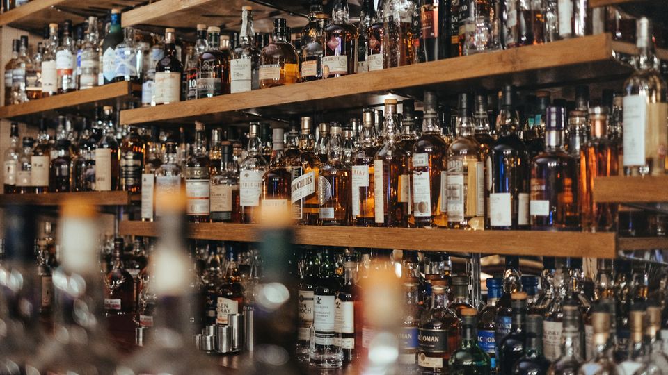 Shelves of alcohol bottles.