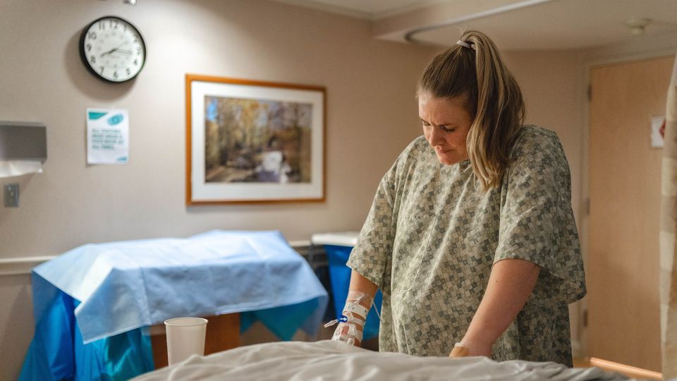 A woman in a hospital in labor.
