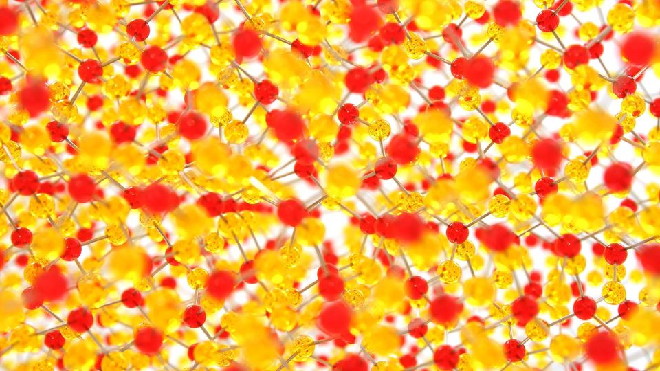 Red and yellow atoms in a crystal structure.