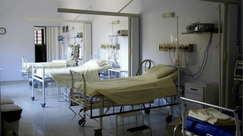 Hospital beds on a ward.