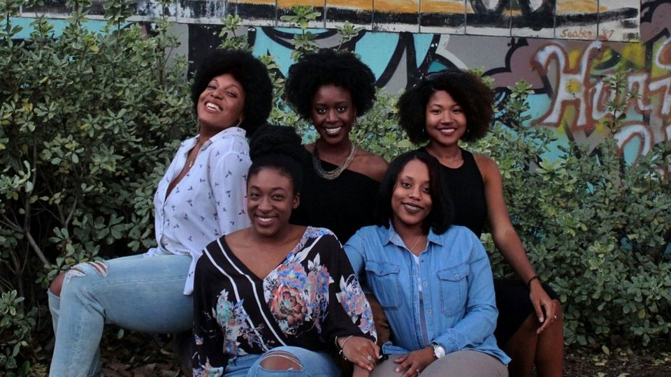 A group of five Black women.