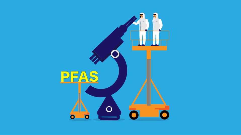 Scientists looking at PFAS letters through a large microscope