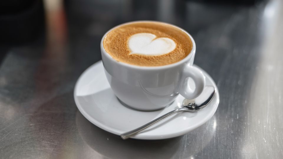 A cappuccino in a cup.