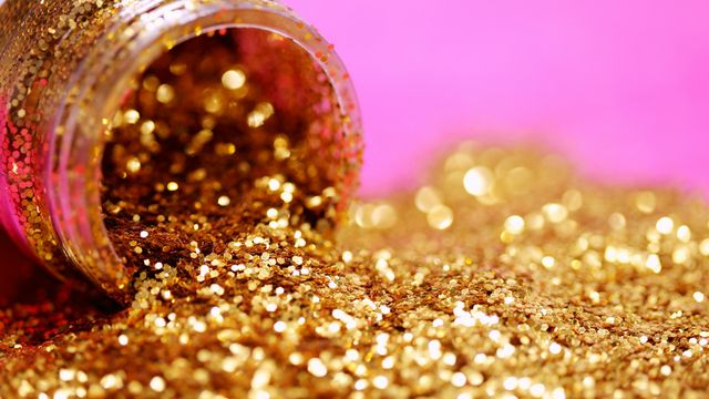 Glitter pouring out of a pot.