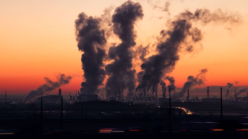 Image taken at sunset with factories producing air pollution
