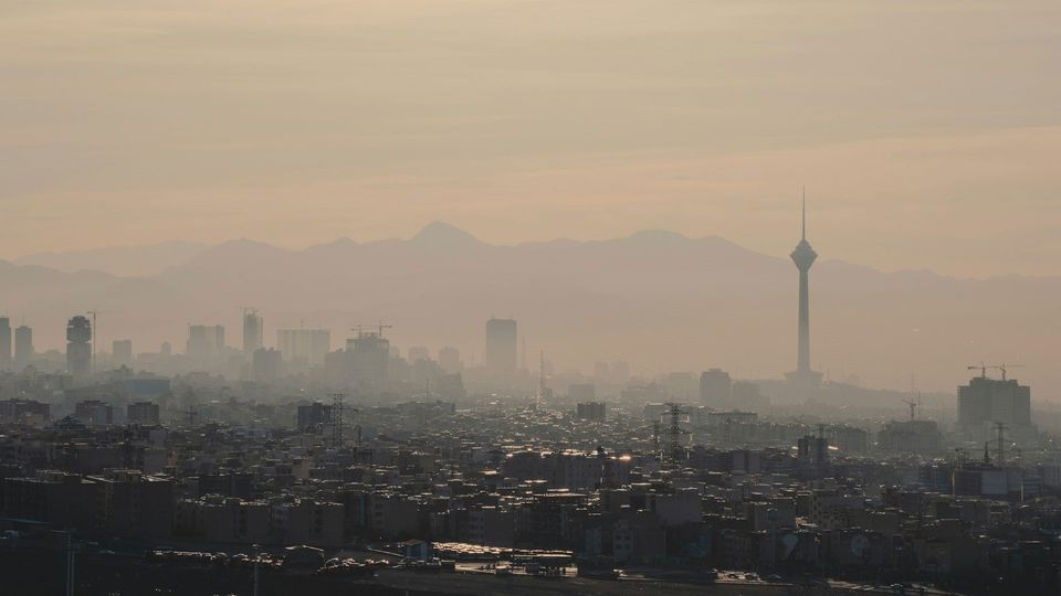 A city, seen through a haze of air pollution.