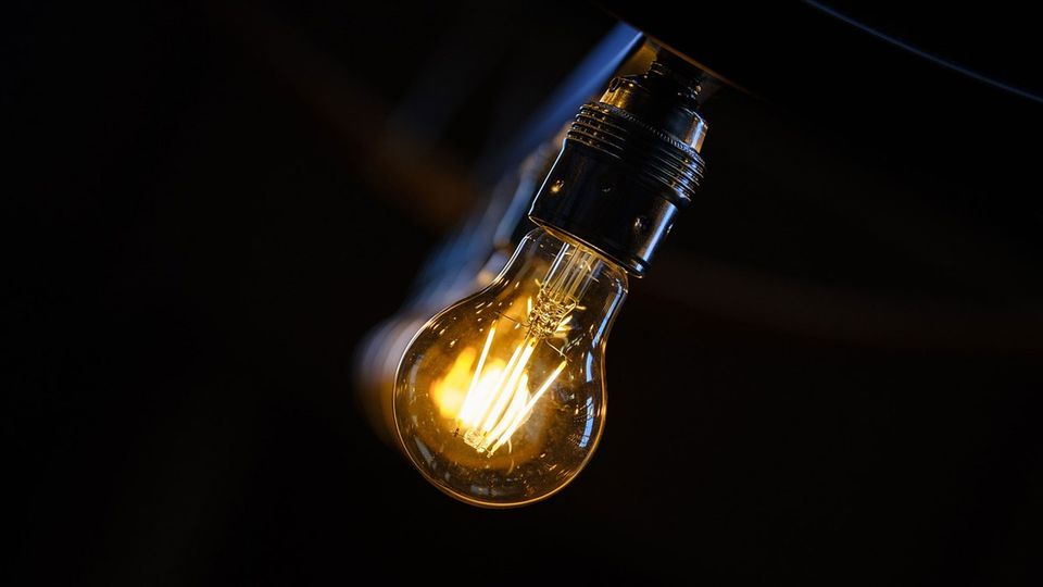 A bright lightbulb with the filament visible.