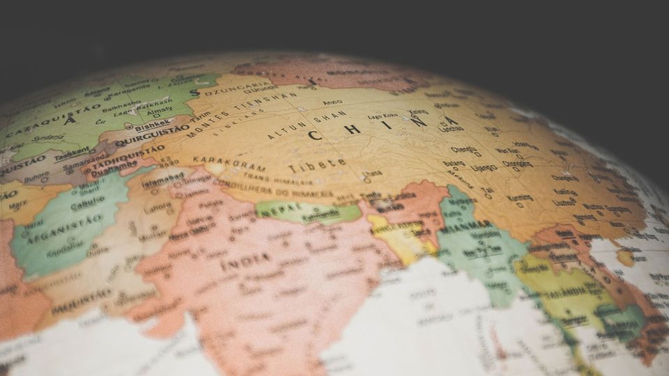 A map of Asia on a globe.