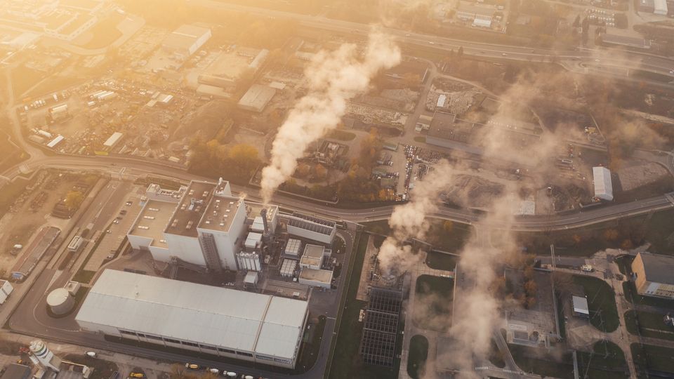 Smoke coming from factory chimneys.