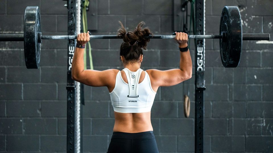 A woman strength training.