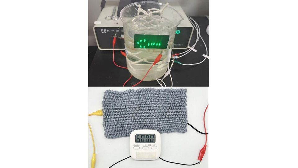 A woven battery is functional in water, and is used to power a timer.