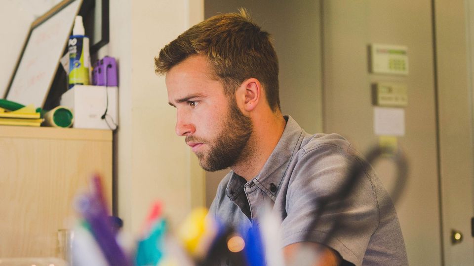 Adult man at work concentrating.
