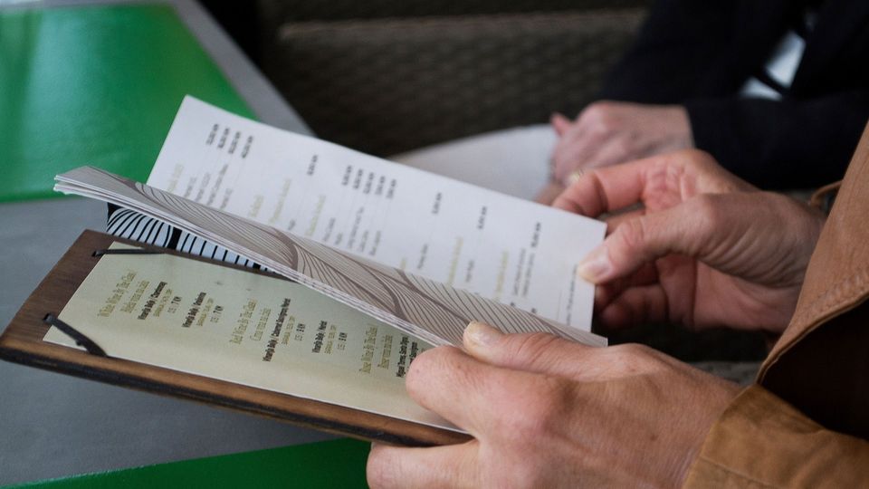 Person looking at menu