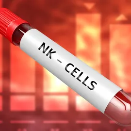 Test tube labeled NK cells with blood sample, representing natural killer cell analysis.