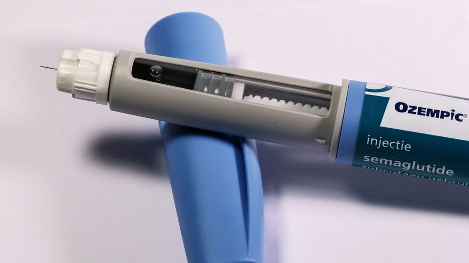 An injector pen, labelled as Ozempic, semaglutide.