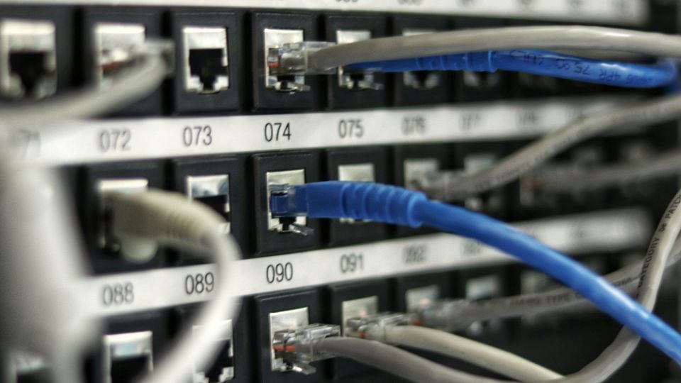 Wires, blue and grey, clicked into ports, each numbered.