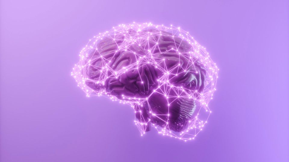A 3D rendering of the brain, with interconnected data points across its surface, indicating connectivity.