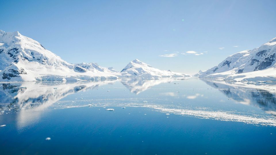 The snowy mountains of Antarctica.
