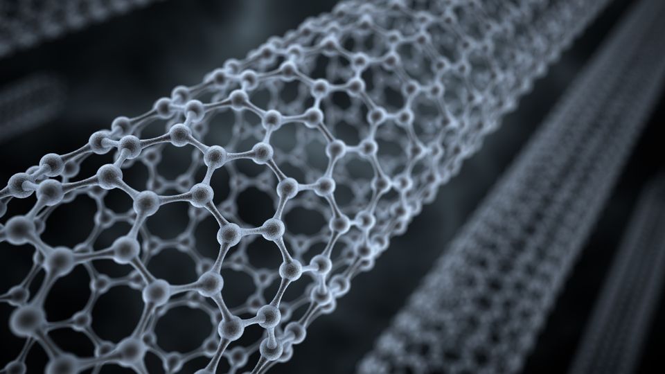 A carbon nanotube structure in grey and white, against a black background.