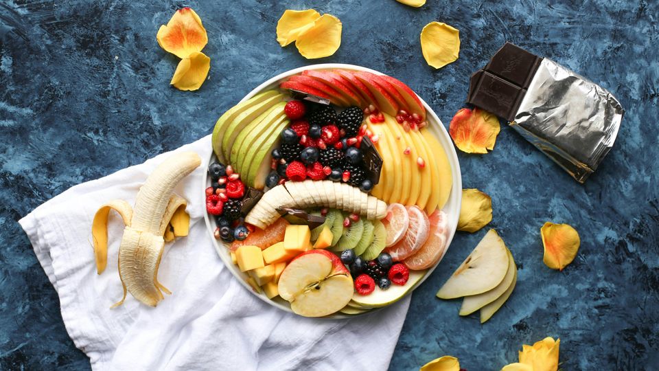 An overhead view of a bowl of fruit salad.