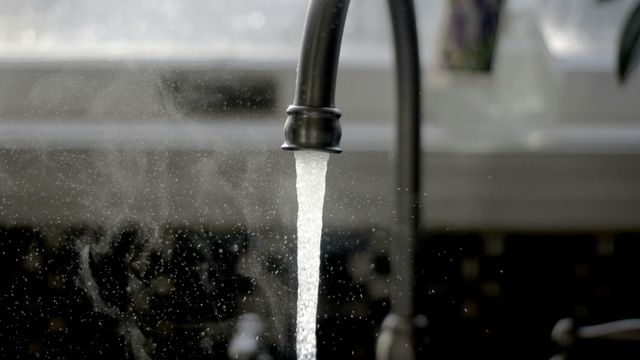 A tap runs water. 