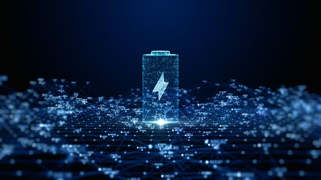 A digital illustration of a battery outline made out of blue dots.
