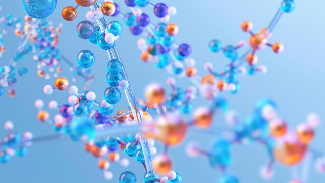 A close-up of various amino acid molecules, which have been found to influence cellular responses to drugs. 