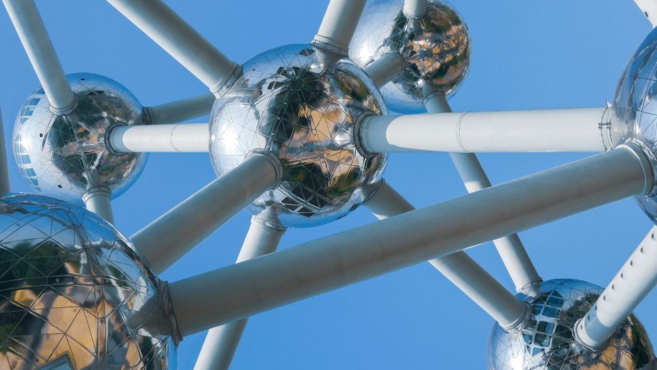 A photo of the ball-and-stick, metallic Atomium landmark in Brussels, Belgium.
